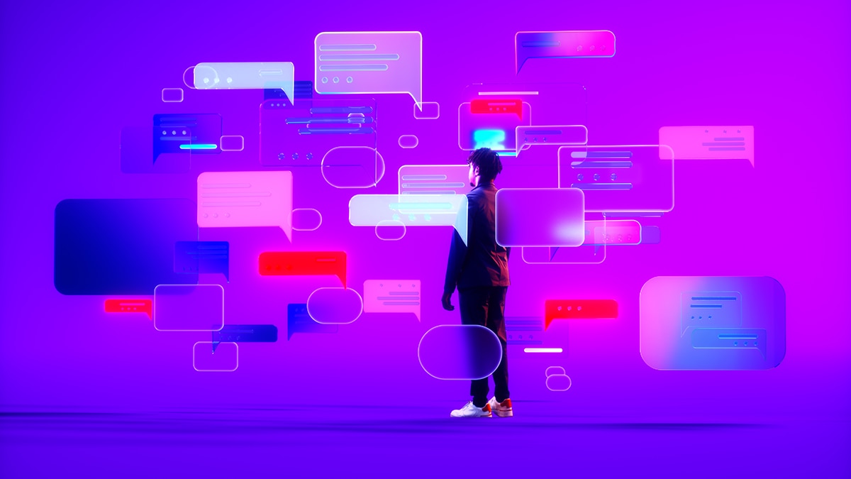 man standing in a cloud of speech bubbles